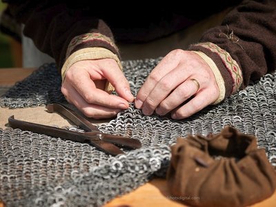 Reenactor weaving chain-maille